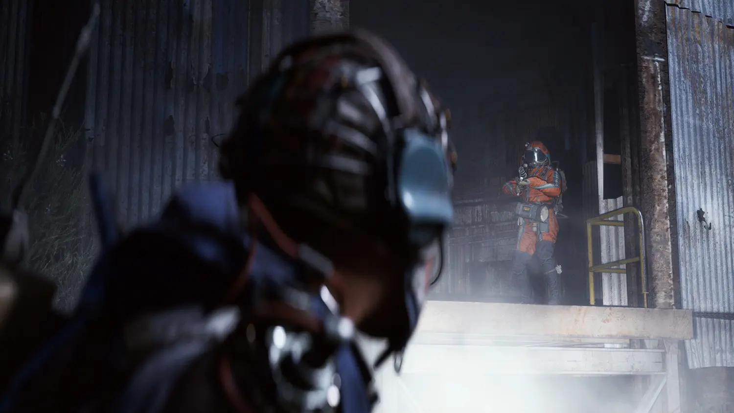 An ARC Raider in an orange surface suit aiming across a derelict industrial building at another raider in Arc Raiders