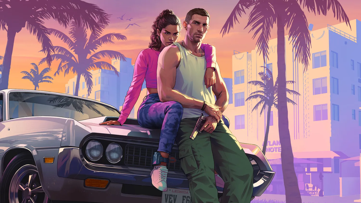 Official key art of Jason Duval and Lucia Caminos in GTA 6, leaning on a muscle car in front of an Art Deco hotel at sunset