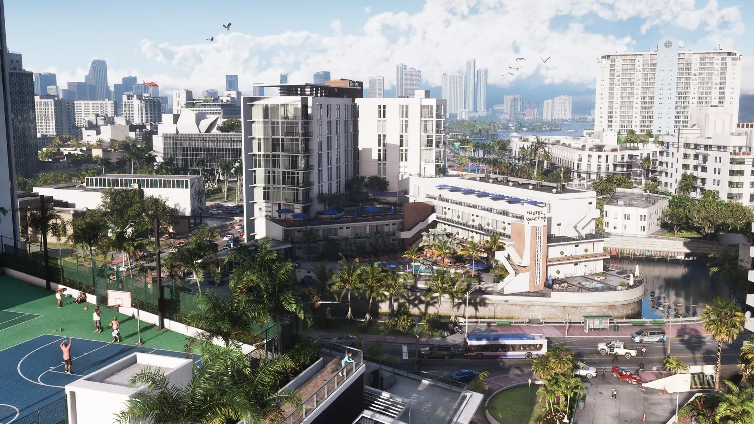 A photorealistic daytime view over modern Vice City in GTA 6, with mid-rise buildings, palm trees and a distant skyline across the bay