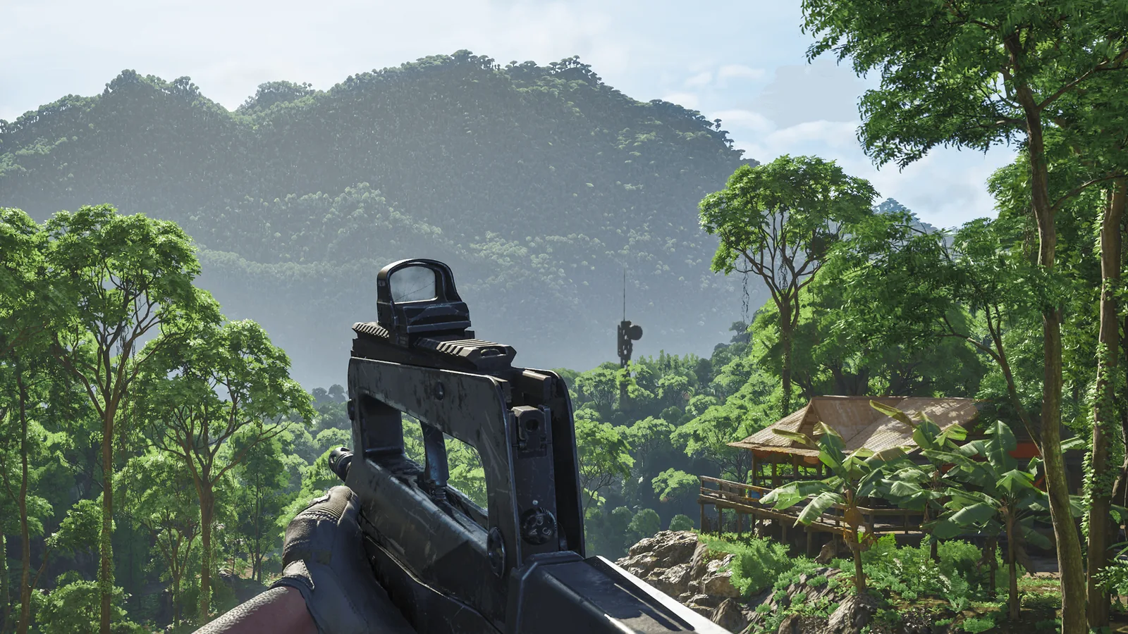 First-person view of a bullpup rifle with a red-dot sight overlooking jungle and a wooden hut in Gray Zone Warfare Update 0.5