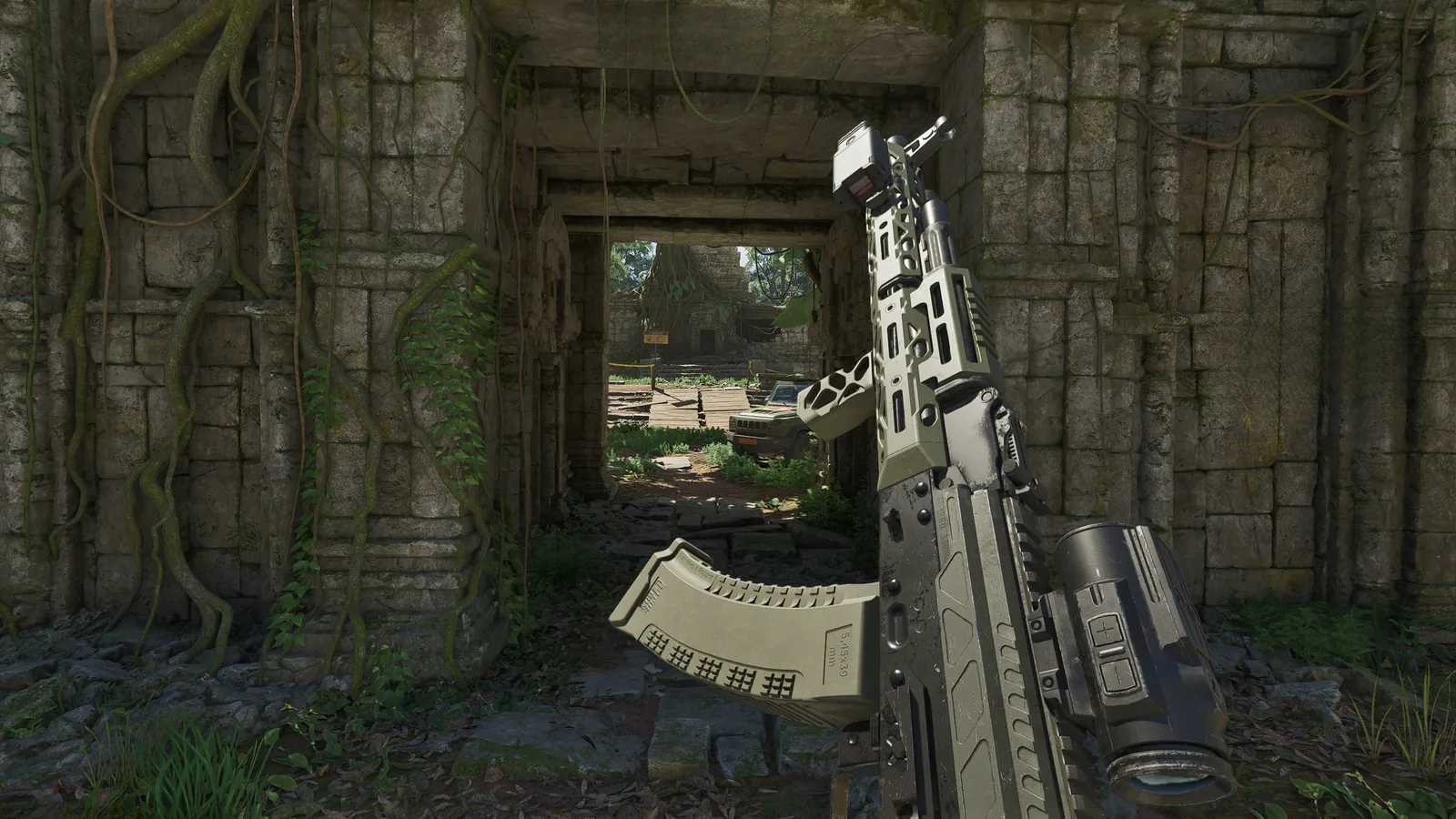First-person view of an AK-74M with green furniture, an extended green magazine and a scope, inside overgrown stone temple ruins in Gray Zone Warfare 0.5