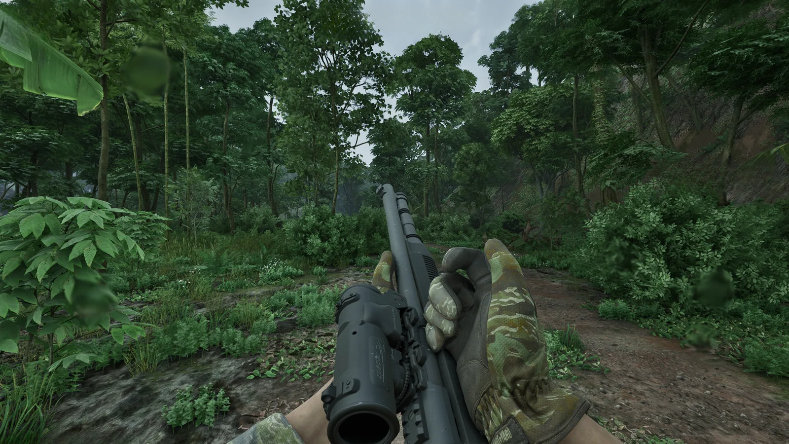 First-person view of a Benelli M4 with an optic on a dirt trail through dense jungle in Gray Zone Warfare 0.5